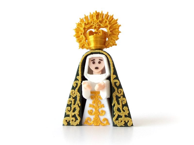 Virgen en miniatura con manto verde bordado y saya blanca bordada vista frontal